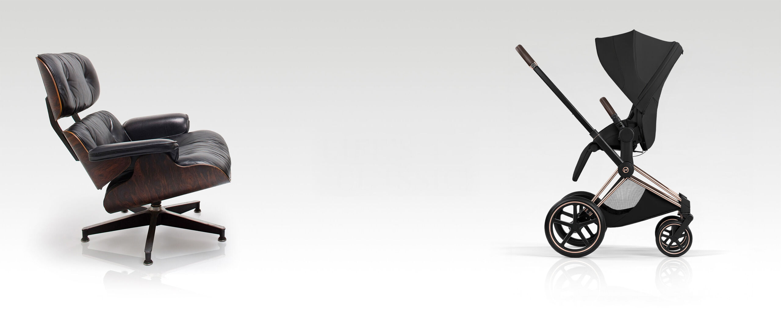 A black, elegant chair next to a modern stroller, with the text "Life's a Classic!" in the centre.