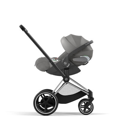 Cloud T reclining infant car seat mounted on a stroller, side view