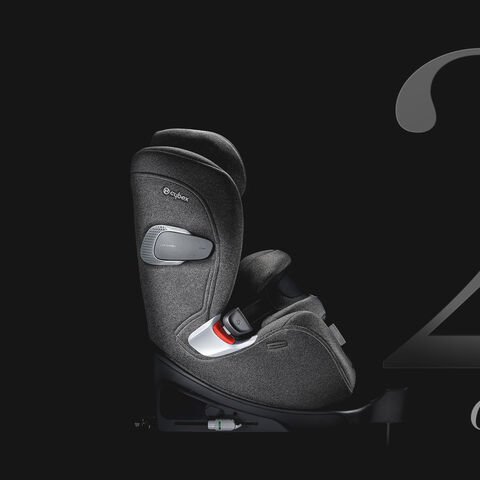 Side view of Anoris T2 i-Size Plus car seat with airbag on a black background.