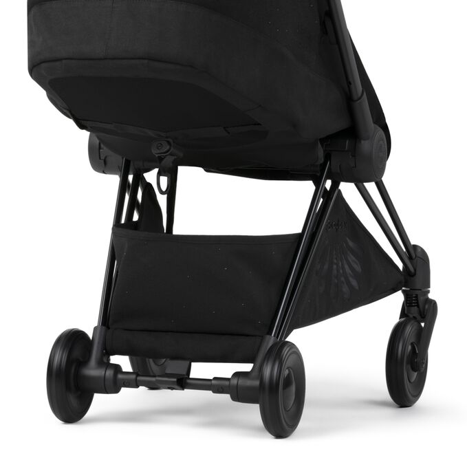 An image of the CYBEX Platinum Coya - La Parisienne Buggy, highlighting the Large Shopping Basket feature.