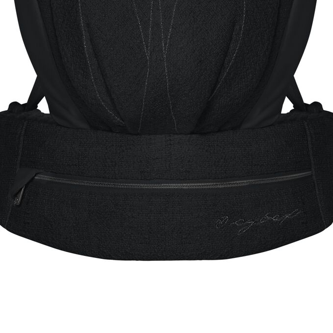 An image of the CYBEX Platinum Coya Carrier Boucl&eacute; Baby Carrier, highlighting the Zip Pocket feature.