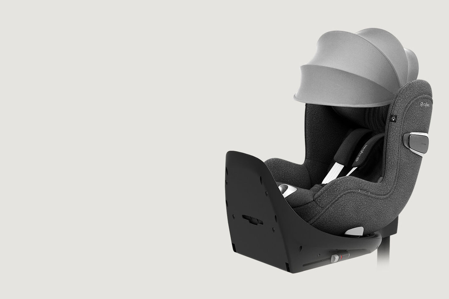 Sirona T rear-facing car seat in grey with sun canopy.
