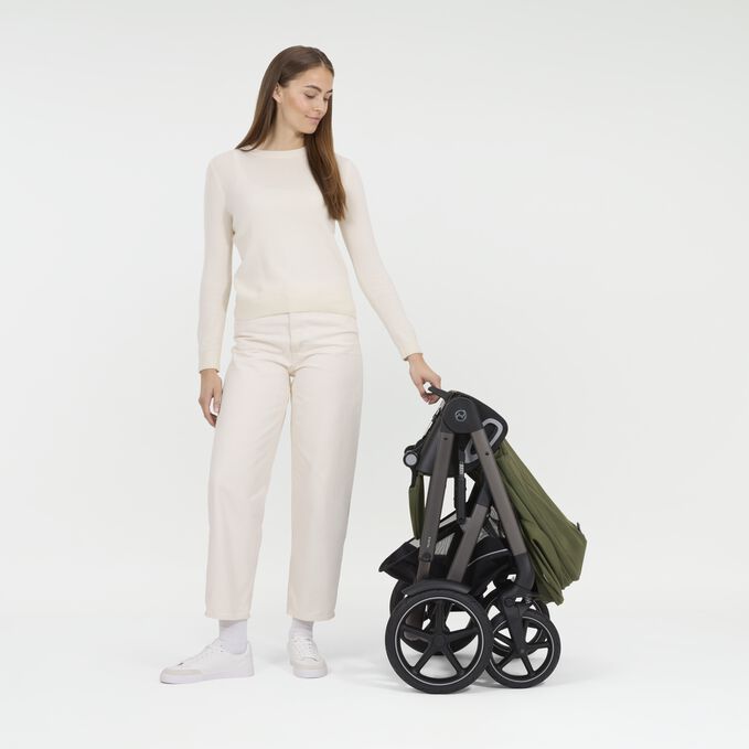 An image of the CYBEX Gold Talos S Lux (2025) Stroller, highlighting the One-hand Fold into Self-standing Position feature.