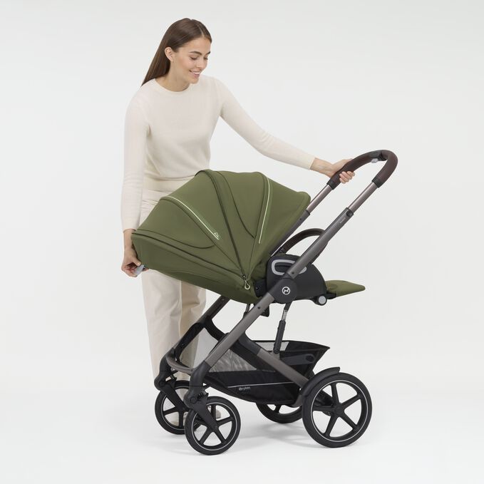 An image of the CYBEX Gold Talos S Lux (2025) Stroller, highlighting the Ergonomic Lie-flat feature.