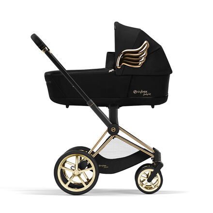 Black by Jeremy Scott Wings pram with gold accents and wing motif