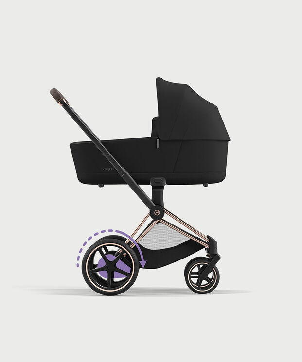 A black pram with a stylish design and large wheels.