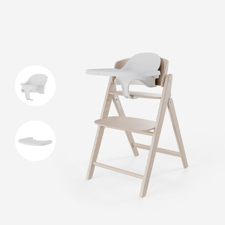 Click and Fold high chair in light wood with white tray and seat.
