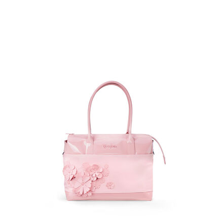 CYBEX Simply Flowers handv&auml;ska i mjukt rosa med blomapplikationer.
