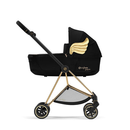 Black pram by Jeremy Scott Wings with gold wings and accents.