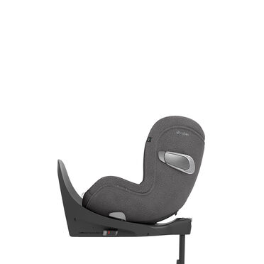 A grey Cybex car seat in side view, mounted on a base.