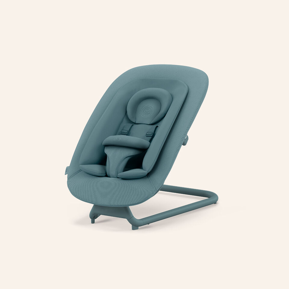 High-quality baby bouncer in soft blue with ergonomic design and safety harness