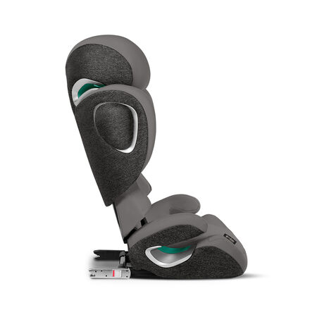 A grey child car seat in side view with adjustable headrest and Isofix attachment.