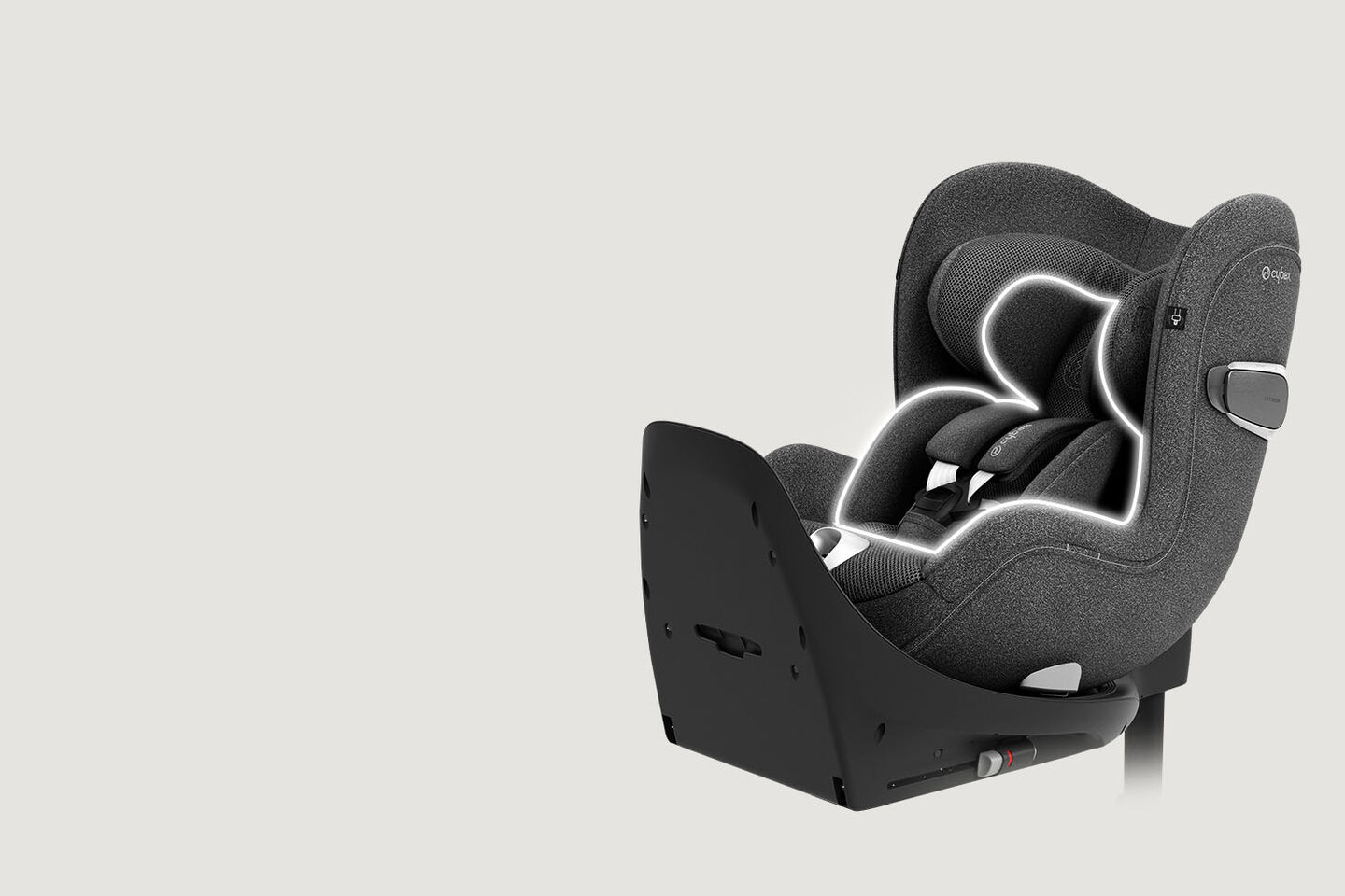 Sirona T rear-facing car seat in grey with a newborn inlay, side view.