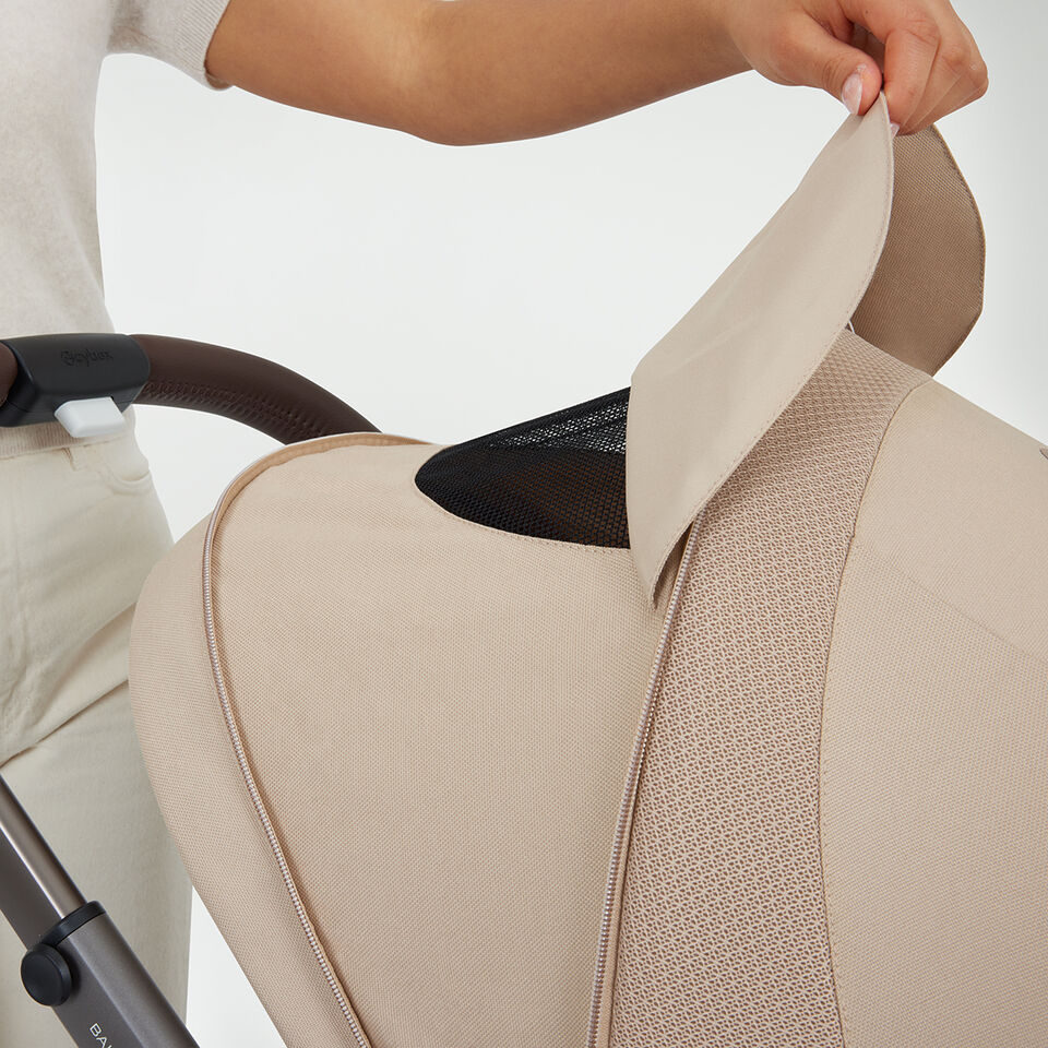 Product shot close-up of the Balios S Lux sun canopy with mesh window open.