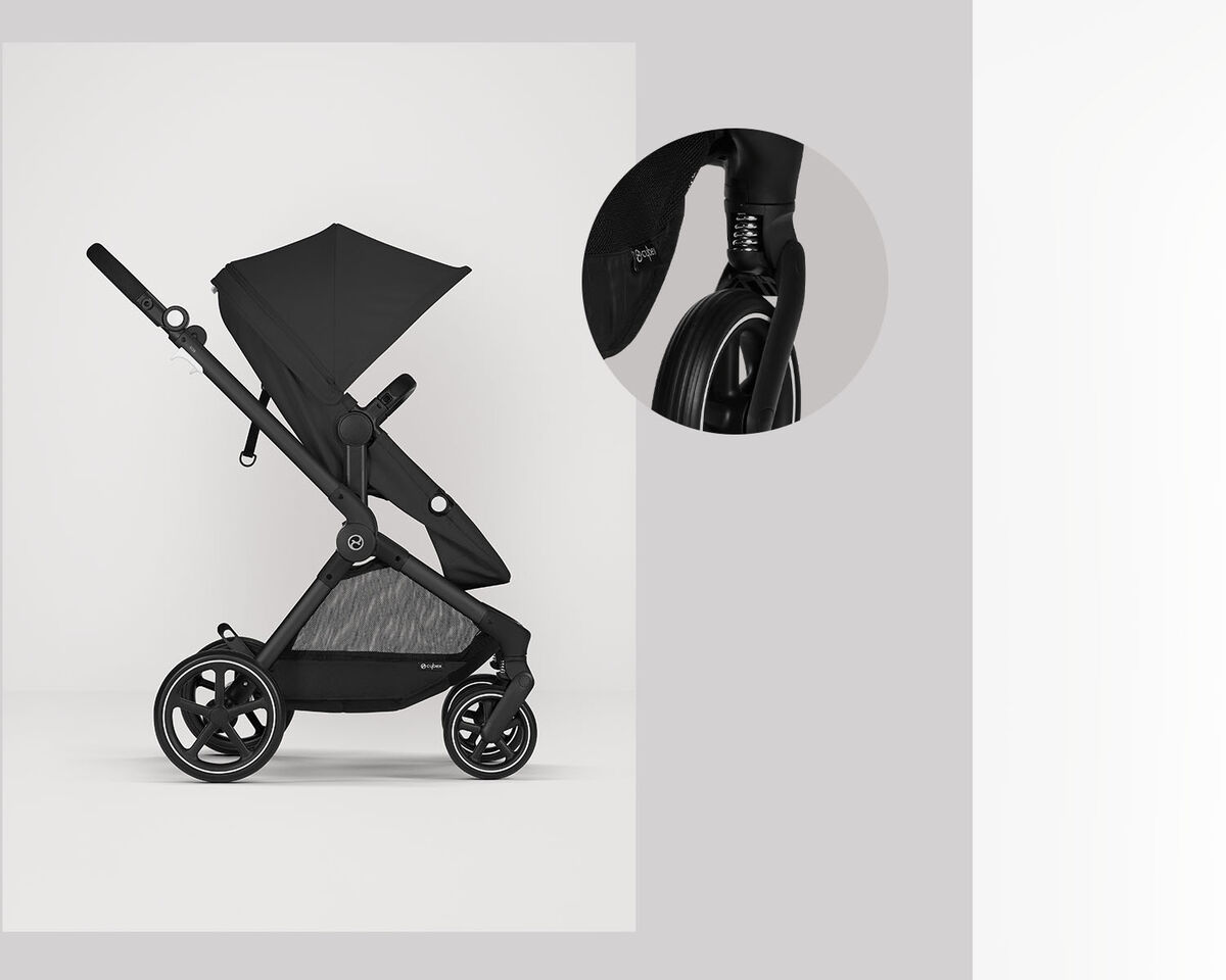 Eos Lux 2 in 1 stroller in black colour with a close-up of the front wheel.