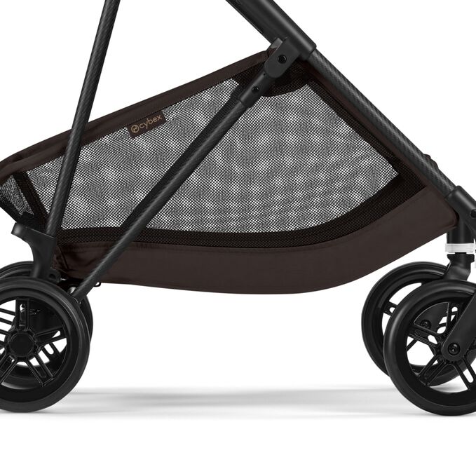 Immagine del CYBEX Gold Melio Carbon Stroller che mette in risalto la caratteristica Capiente cestello per la spesa del colore coordinato.