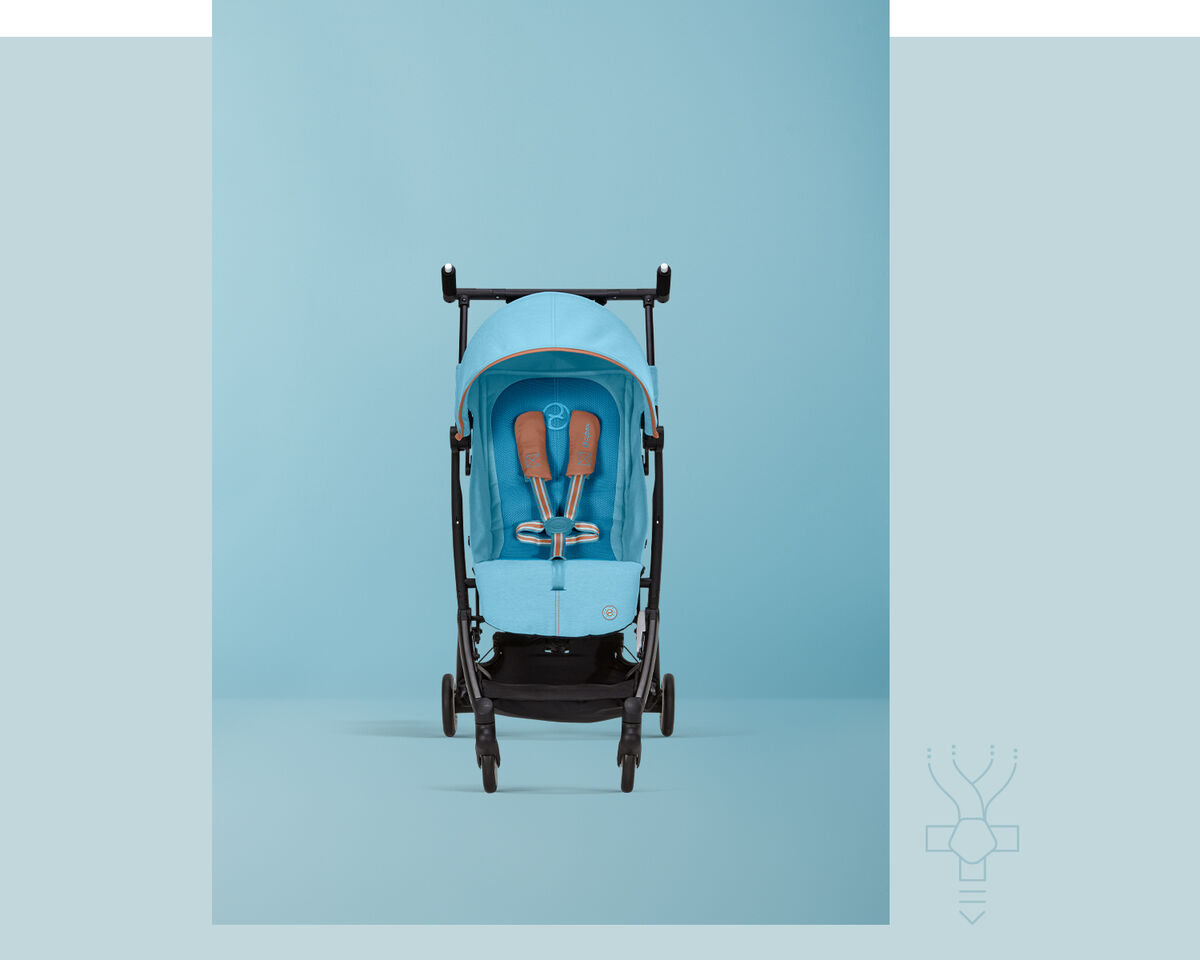 Libelle smallest fold stroller in light blue against a blue background.