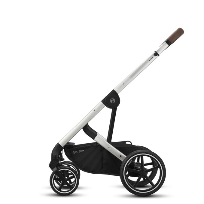 An image of the CYBEX Gold Balios S Lux 1 Stroller, highlighting the Never-flat all terrain wheels feature.