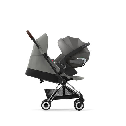 Stroller with the Cloud T reclining infant car seat, noted for its reclining feature.