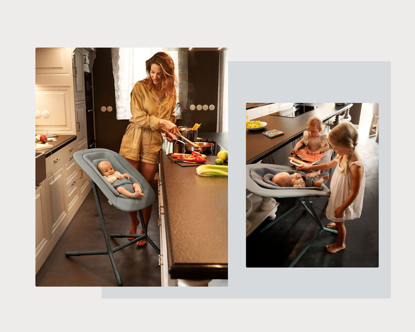 Woman cooking in the kitchen while a baby sits in a Lemo Training Tower learning tower.
