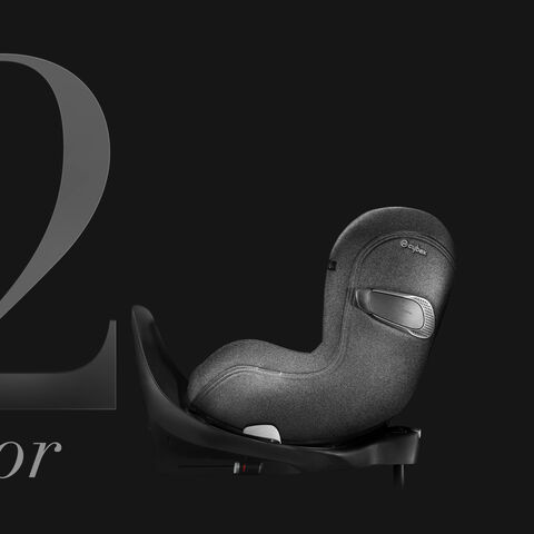 The Cybex Sirona T2 child car seat in side view on a black background