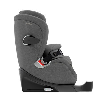 Side view of Anoris T car seat in grey, featuring a safety harness and Isofix base.