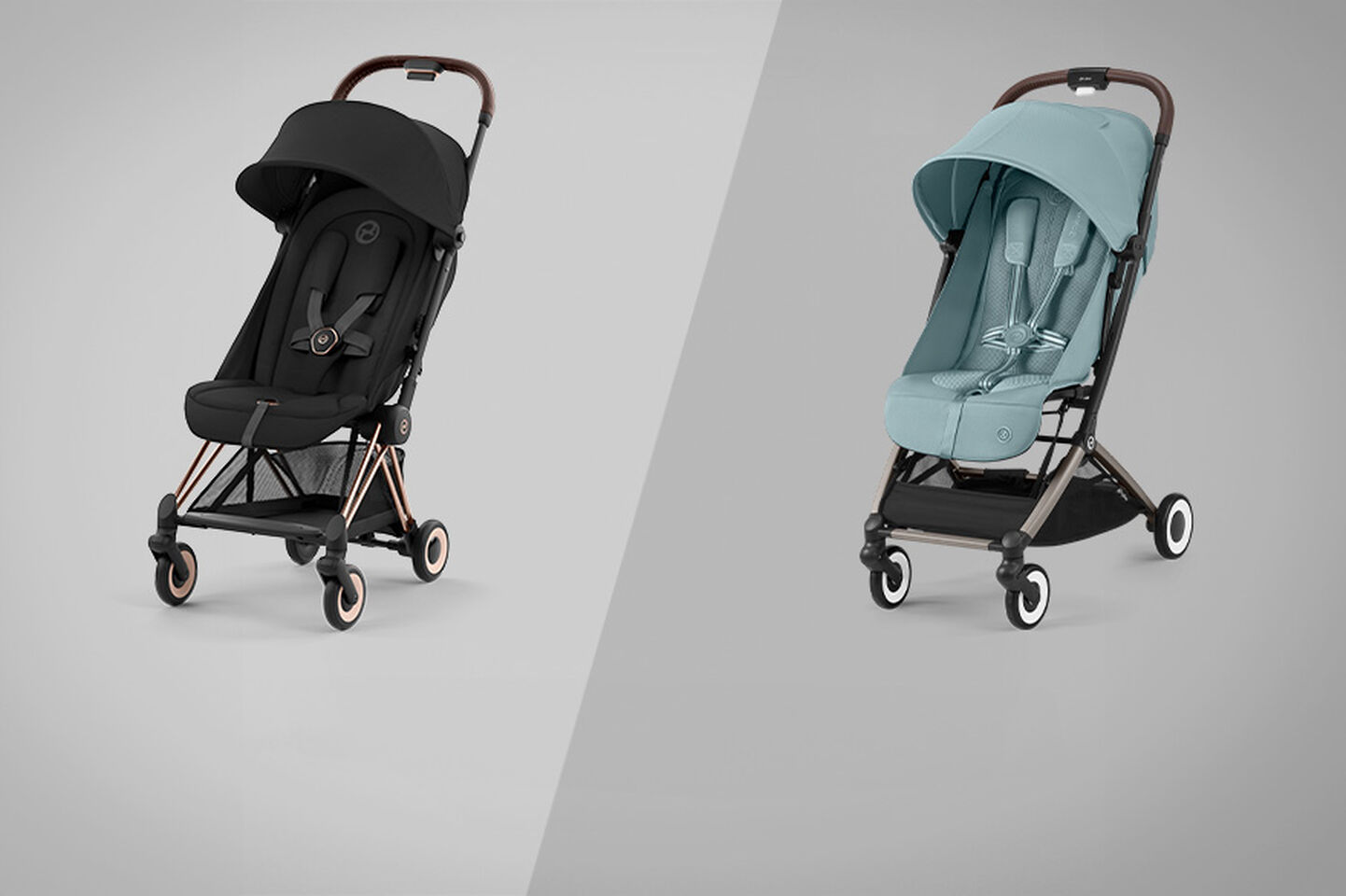 Two strollers in black and light blue side by side on a grey background.