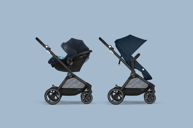 Eos Lux 2 in 1 stroller shown in two configurations on a blue background.