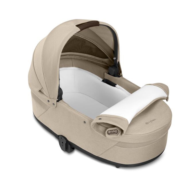 An image of the CYBEX Gold Cot S Lux Stroller, highlighting the Cosy and Spacious Interior feature.