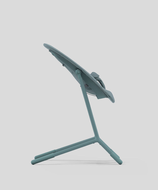 A modern blue chair in a side view with a minimalist design.