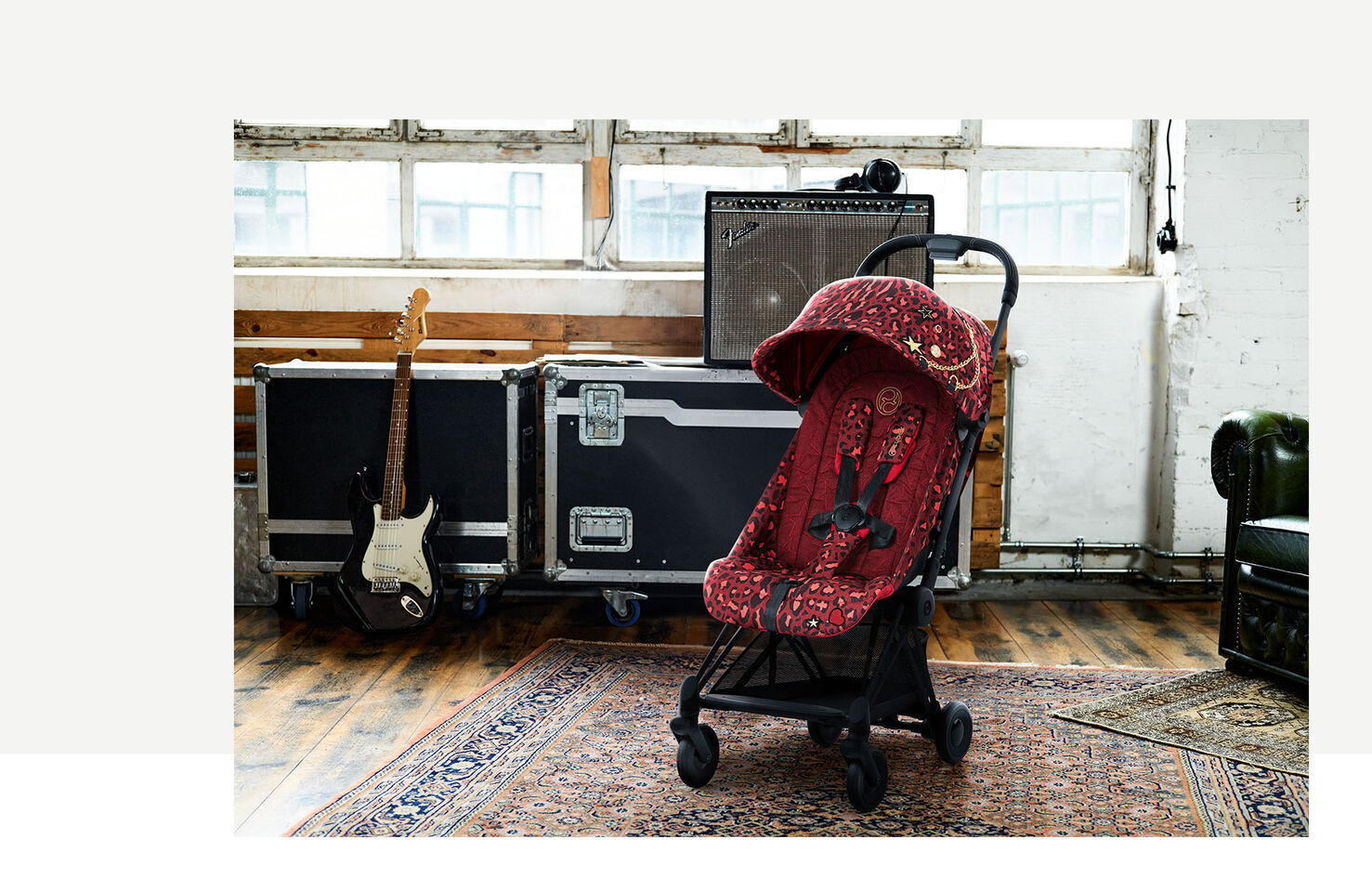 CYBEX Rockstar pushchair in a music studio with an amplifier in the background.