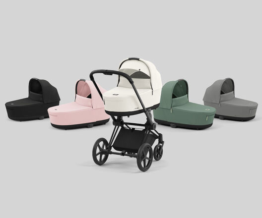 Pram in various colours, including black, pink, white, green, and grey, on a grey background.