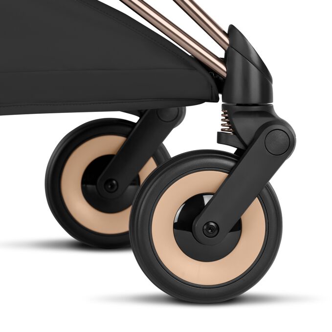 An image of the CYBEX Platinum Coya - Style Collection Buggy, highlighting the Front Wheel Suspension feature.