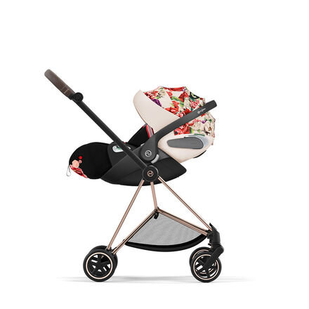 CYBEX Spring Blossom pushchair with floral pattern, side view.