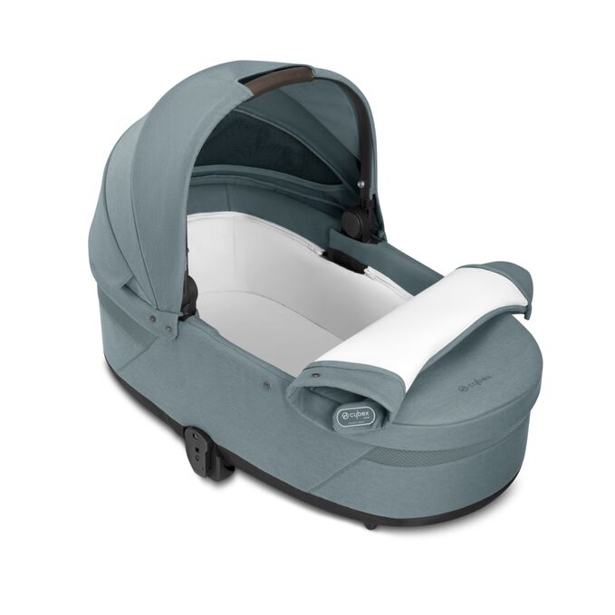 An image of the CYBEX Gold Cot S Lux Stroller, highlighting the Cozy and Spacious Interior feature.