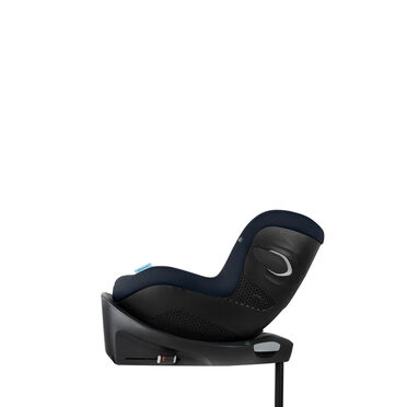 Side view of a black and dark blue child car seat on a white background.
