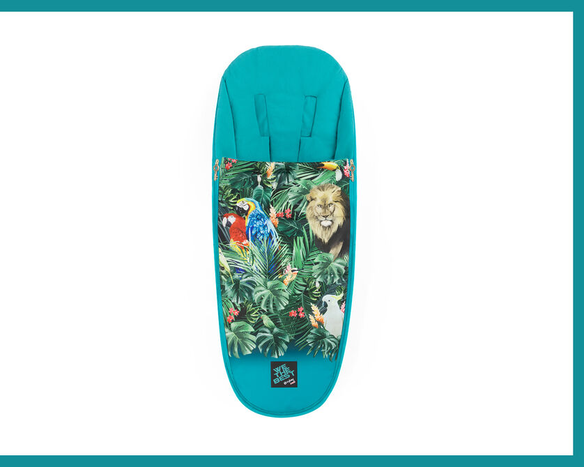 by DJ Khaled stroller liner featuring a tropical animal pattern with parrots and a lion on a turquoise background.