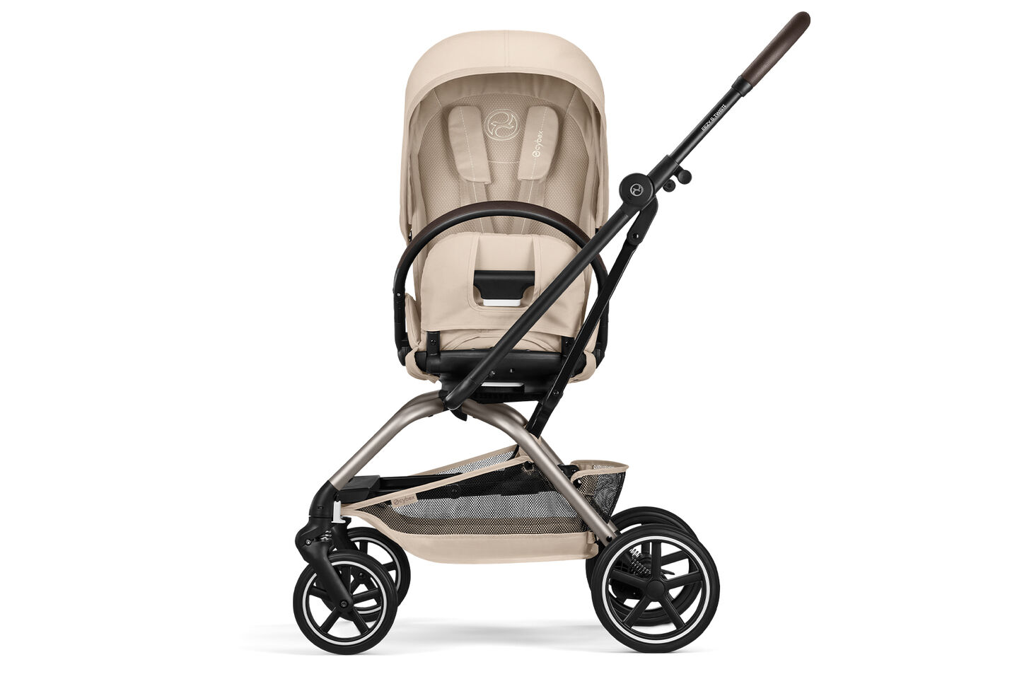 Eezy S Twist +2 stroller in Almond Beige, featuring a 360-degree rotation capability, sturdy frame, and convenient storage basket.