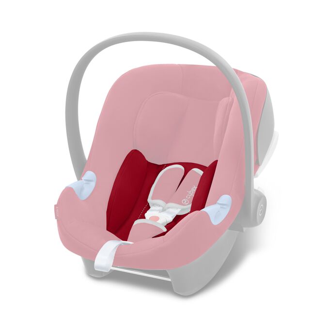 An image of the CYBEX Silver Aton B i-Size Infant Car Seat, highlighting the Adapts the seat for the smallest ones feature.