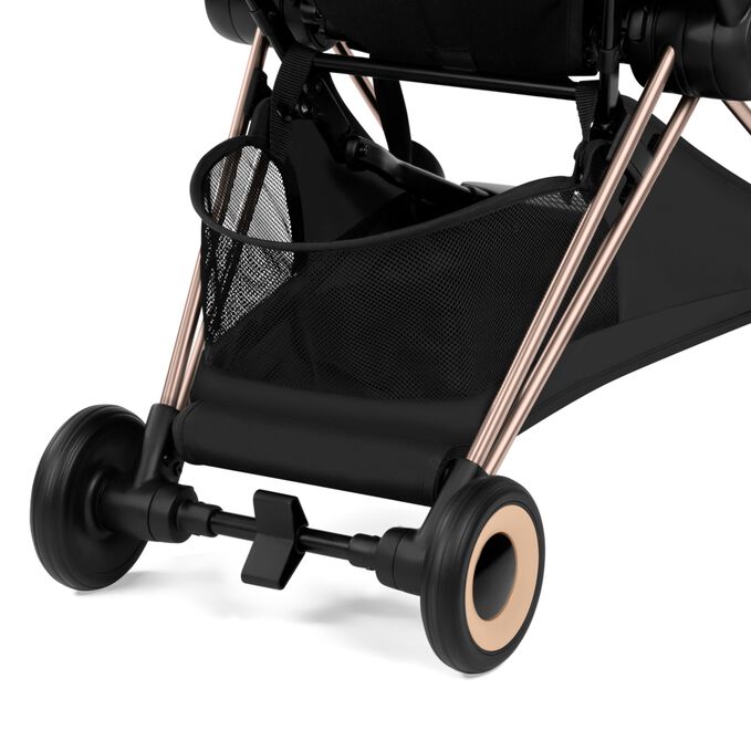 An image of the CYBEX Platinum Coya - Style Collection Buggy, highlighting the Large Color-matching Shopping Basket feature.