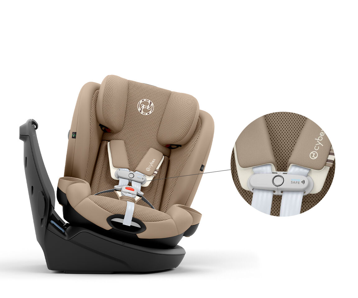 Beige Callisto G 360 rotating convertible car seat with close-up of safety harness detail.