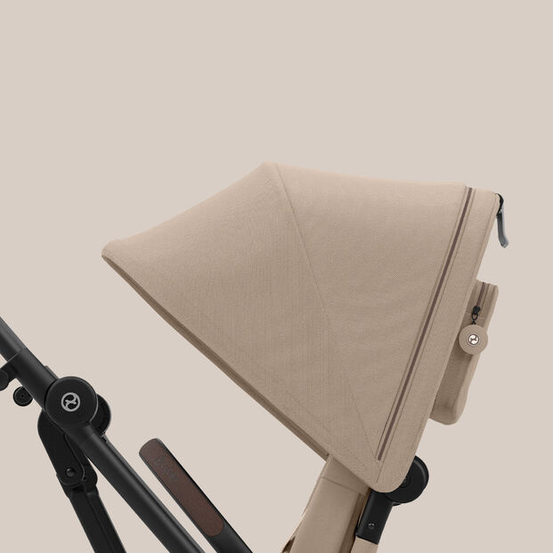 Eezy S Twist +2 pushchair in beige showing the side view of the hood.