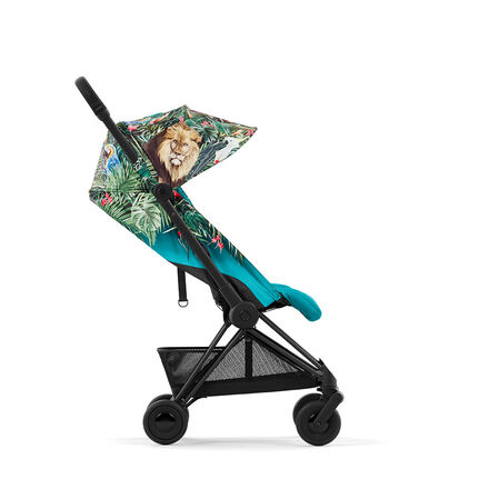Pushchair by DJ Khaled featuring a tropical design with a lion motif on the canopy.