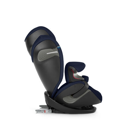 A modern child car seat in side view with dark blue and grey design.