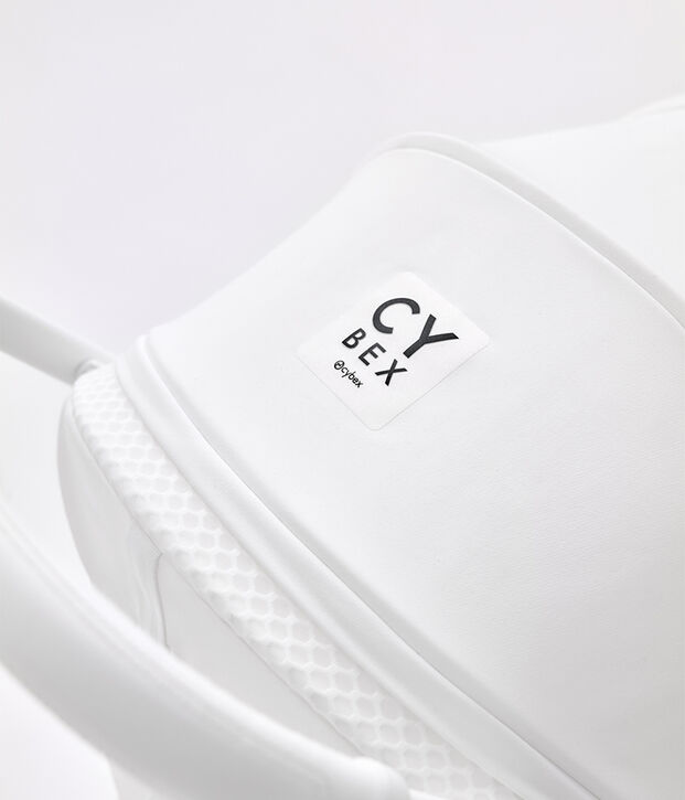 Cybex logo on a white pram.