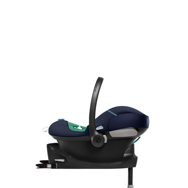 A dark blue car seat with a black base and a carrying handle.