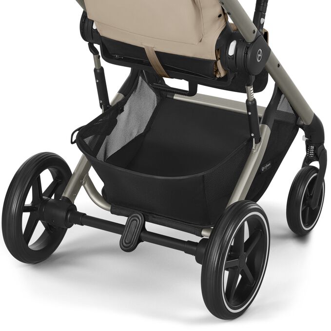 An image of the CYBEX Gold Balios S Lux (2025) Stroller, highlighting the Spacious Shopping Basket feature.