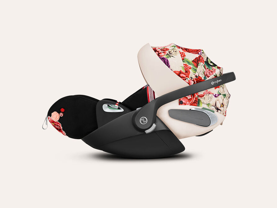 CYBEX Spring Blossom infant car seat with floral pattern on a light background.