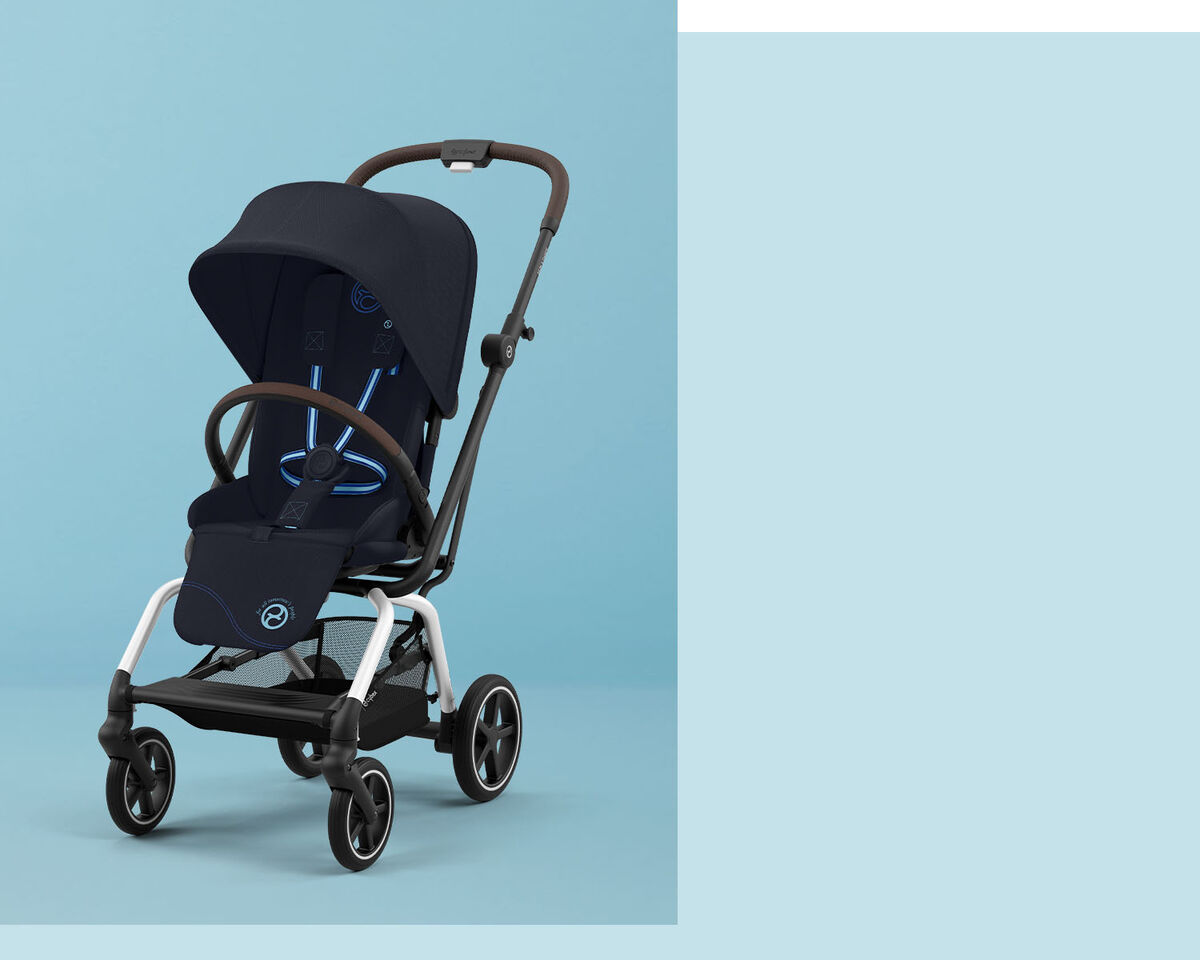 Eezy S Twist +2 pram in dark blue against a light blue background.