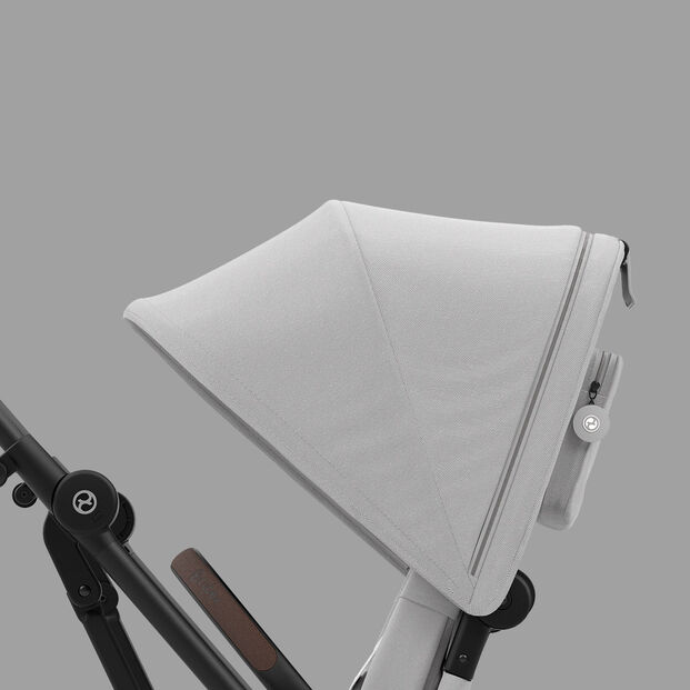 Eezy S Twist +2 pushchair with a grey canopy on a grey background.
